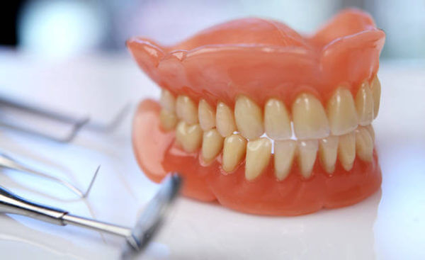 Полный съемный пластиночный протез на зубы фото